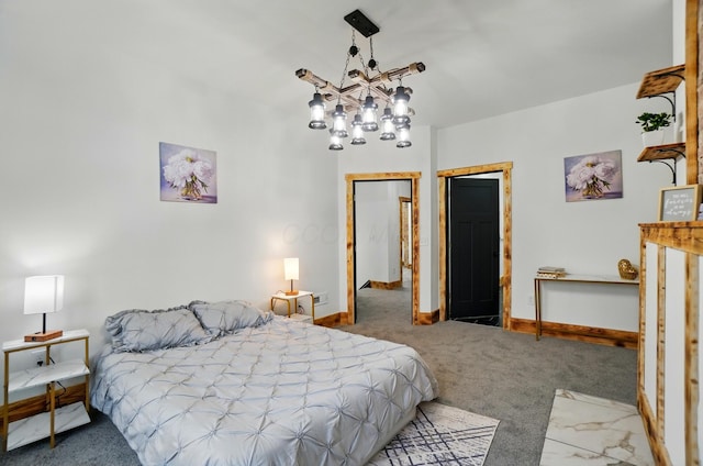525 Saint Clair Ave, Columbus, OH 43203 - carpeted bedroom featuring a chandelier and baseboards