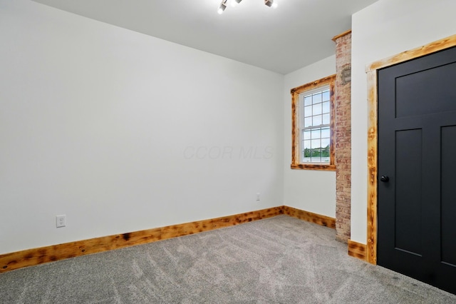 525 Saint Clair Ave, Columbus, OH 43203 - carpeted spare room featuring baseboards