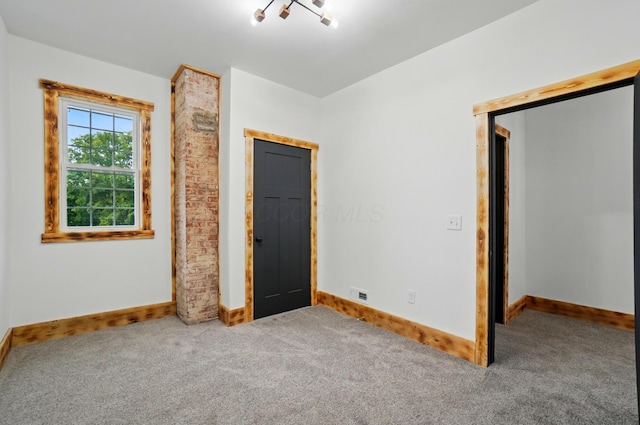 525 Saint Clair Ave, Columbus, OH 43203 - unfurnished bedroom with carpet floors and baseboards