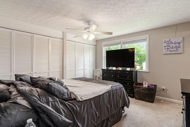 6407 Skywae Dr, Columbus, OH 43229 - bedroom featuring carpet flooring, ceiling fan, baseboards, and a textured ceiling