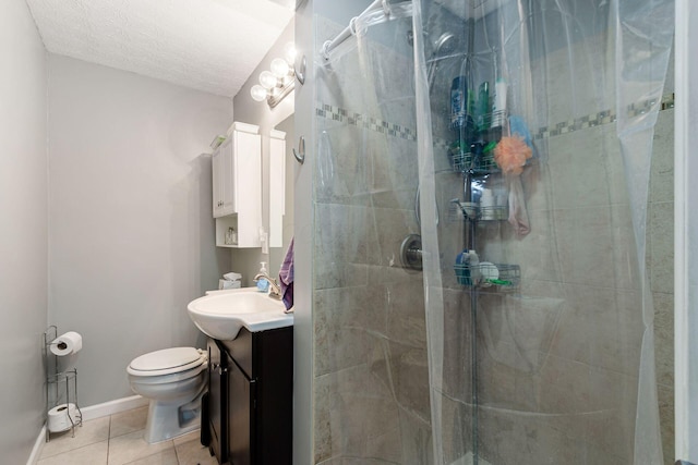 6407 Skywae Dr, Columbus, OH 43229 - bathroom with vanity, toilet, tile patterned floors, a shower stall, and a textured ceiling
