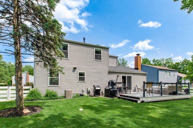 6407 Skywae Dr, Columbus, OH 43229 - back of property with a wooden deck and a chimney
