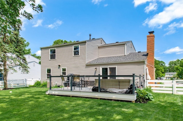 6407 Skywae Dr, Columbus, OH 43229 - back of property featuring a wooden deck, a chimney, and a shingled roof