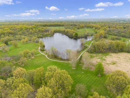 6407 Skywae Dr, Columbus, OH 43229 - aerial overview of property's location featuring a large body of water and a forest