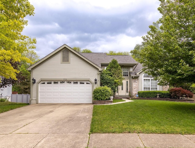 7711 Eagle Creek Dr, Pickerington, OH 43147 - view of front facade with concrete driveway, a garage, and roof with shingles