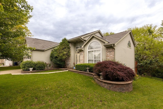 7711 Eagle Creek Dr, Pickerington, OH 43147 - view of front of property with a front yard and roof with shingles