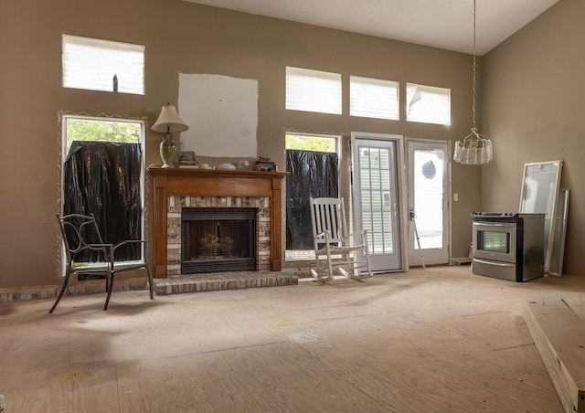 7711 Eagle Creek Dr, Pickerington, OH 43147 - living area with a fireplace and a high ceiling