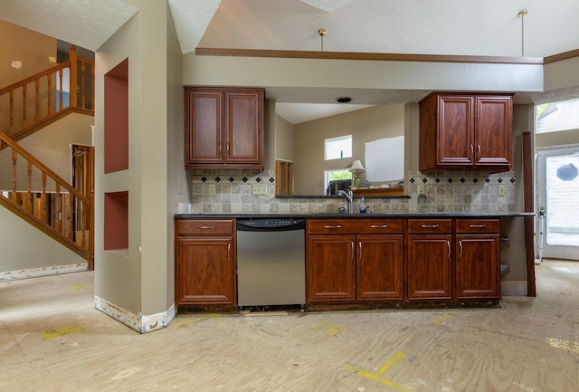 7711 Eagle Creek Dr, Pickerington, OH 43147 - kitchen with dishwasher, tasteful backsplash, a sink, vaulted ceiling, and baseboards