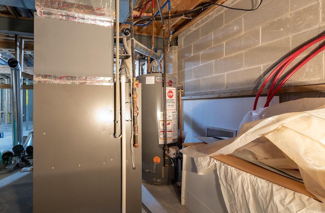7711 Eagle Creek Dr, Pickerington, OH 43147 - utility room with gas water heater