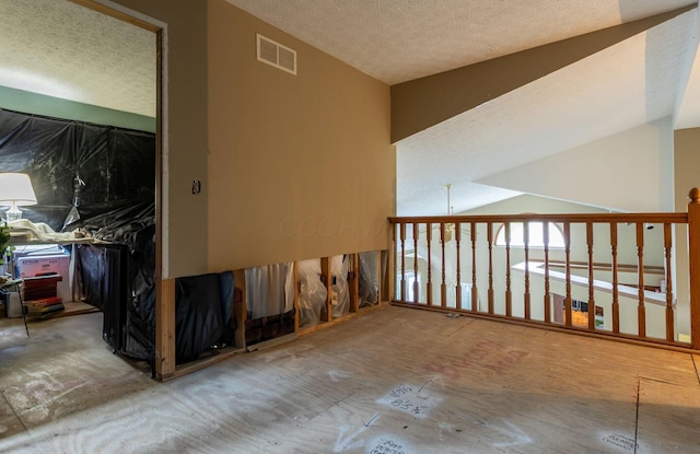 7711 Eagle Creek Dr, Pickerington, OH 43147 - spare room with a textured ceiling
