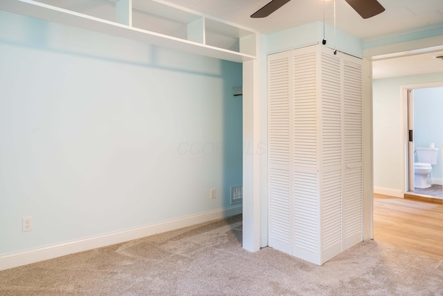 2535 Gooding Rd, Marion, OH 43302 - unfurnished bedroom with carpet, a closet, ceiling fan, and baseboards