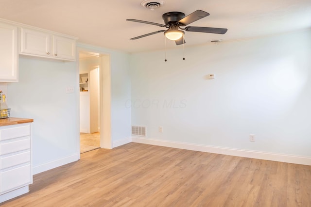 2535 Gooding Rd, Marion, OH 43302 - unfurnished room featuring light wood-style floors, a ceiling fan, baseboards, and crown molding