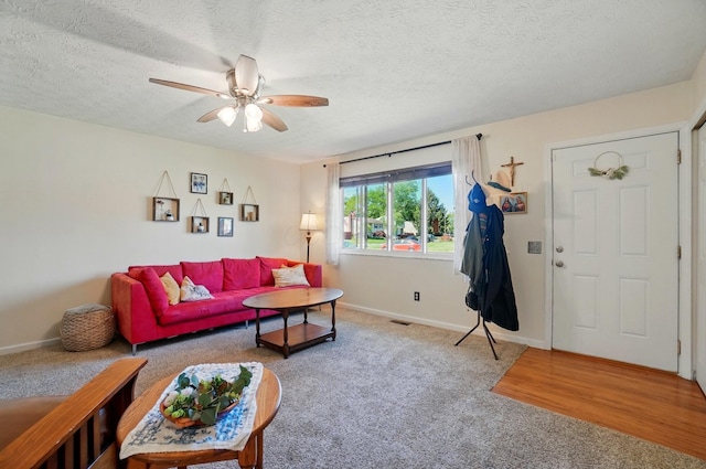 3784 Hendron Rd, Groveport, OH 43125 - living area featuring carpet, ceiling fan, a textured ceiling, and baseboards