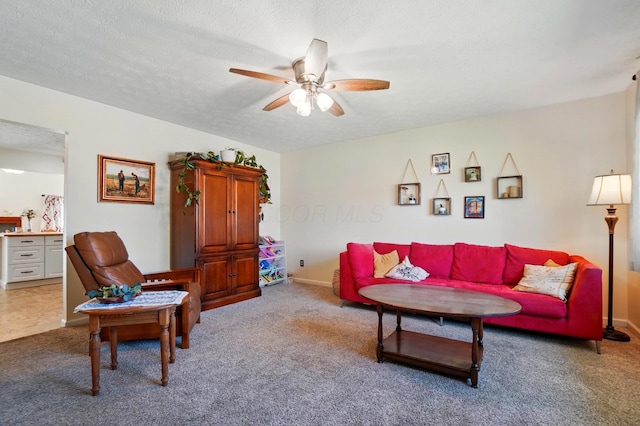 3784 Hendron Rd, Groveport, OH 43125 - living room with carpet flooring, a ceiling fan, and baseboards