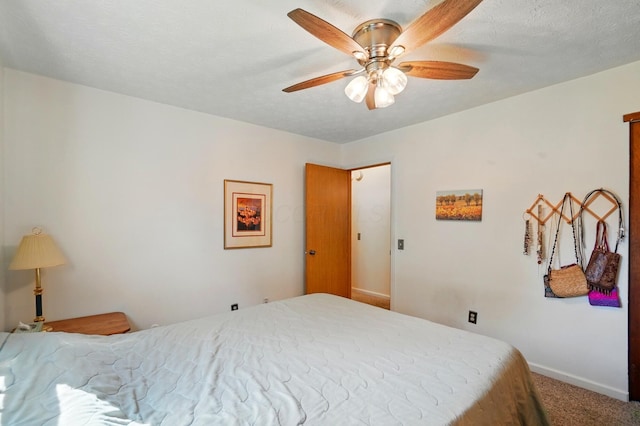 3784 Hendron Rd, Groveport, OH 43125 - carpeted bedroom with baseboards and a ceiling fan