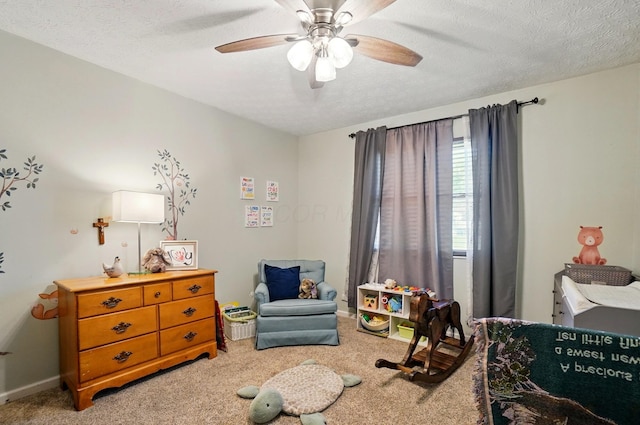 3784 Hendron Rd, Groveport, OH 43125 - bedroom featuring light colored carpet, a textured ceiling, ceiling fan, and baseboards
