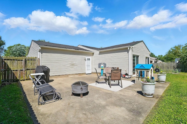 3784 Hendron Rd, Groveport, OH 43125 - back of house featuring a fire pit and a patio area