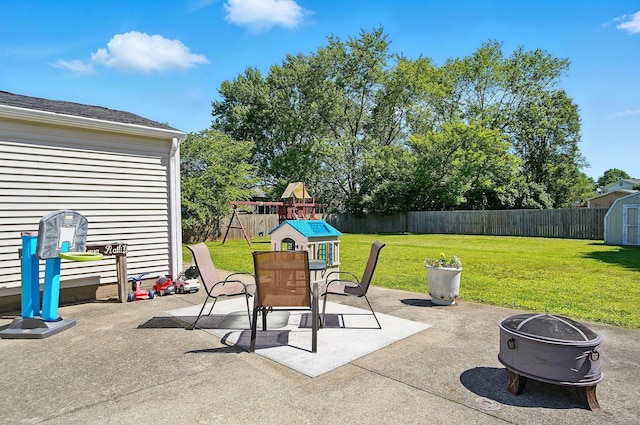 3784 Hendron Rd, Groveport, OH 43125 - view of patio / terrace featuring an outdoor fire pit and a playground