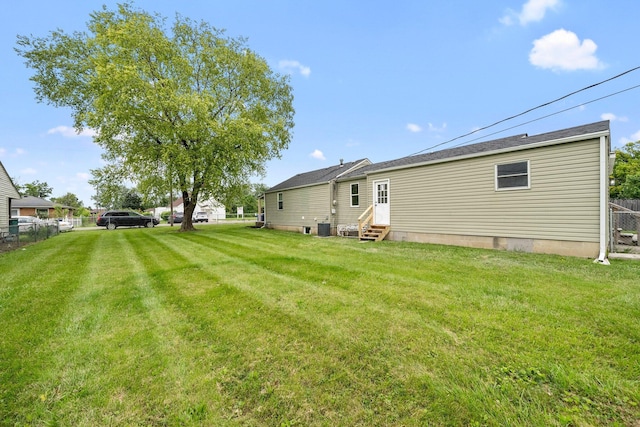 1006 Midland Ave, Columbus, OH 43223 - view of yard with entry steps and central air condition unit