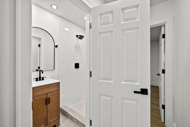 1006 Midland Ave, Columbus, OH 43223 - full bath with vanity, a tile shower, and recessed lighting