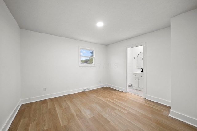 1006 Midland Ave, Columbus, OH 43223 - unfurnished room featuring light wood-type flooring, baseboards, and recessed lighting