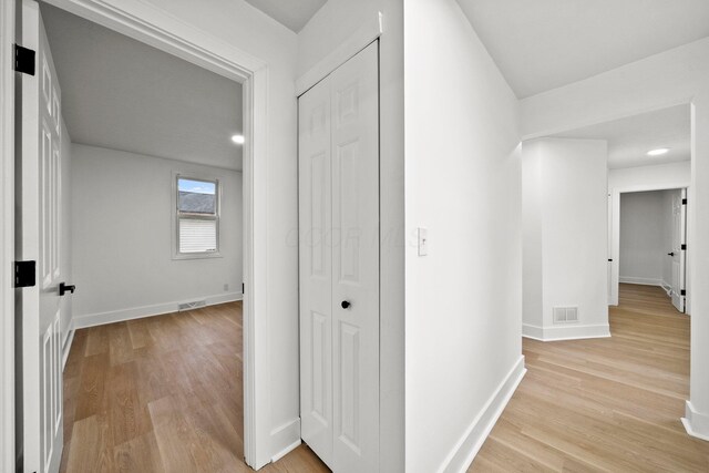 1006 Midland Ave, Columbus, OH 43223 - hall with light wood-style floors, baseboards, and recessed lighting