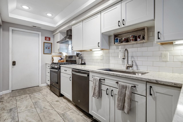 2539 Trotterslane Dr, Columbus, OH 43235 - kitchen with appliances with stainless steel finishes, wall chimney exhaust hood, a sink, tasteful backsplash, and recessed lighting