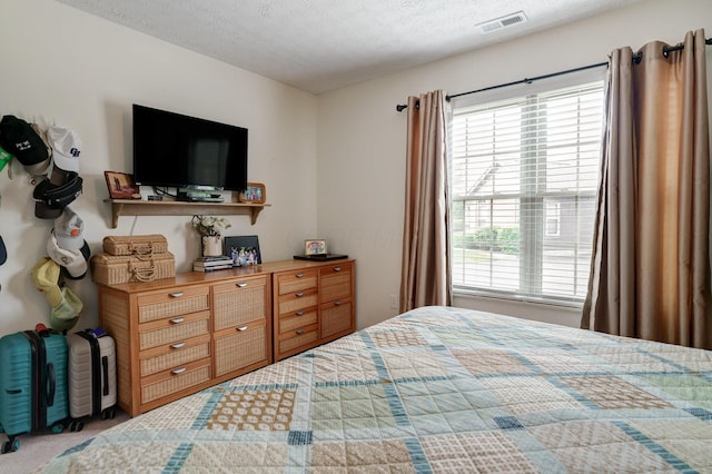 2539 Trotterslane Dr, Columbus, OH 43235 - bedroom featuring a textured ceiling and carpet