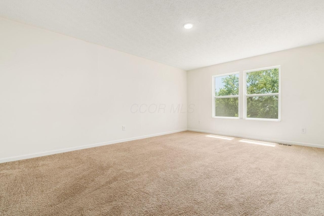3339 Lauren Fields Dr S, Groveport, OH 43125 - spare room with carpet flooring, baseboards, recessed lighting, and a textured ceiling