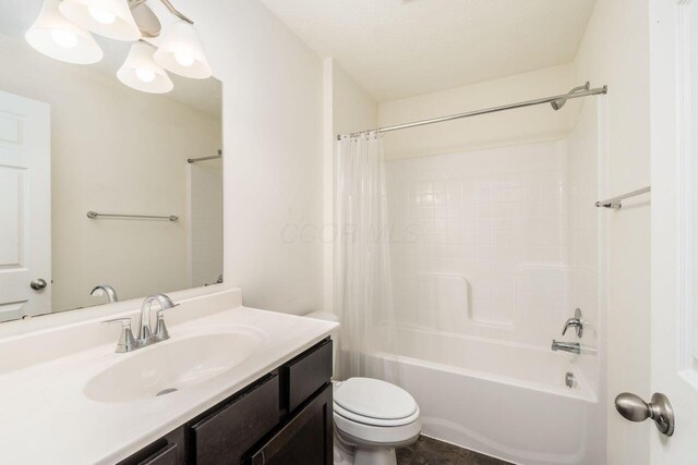 3339 Lauren Fields Dr S, Groveport, OH 43125 - bathroom featuring vanity, shower / bath combo with shower curtain, and toilet