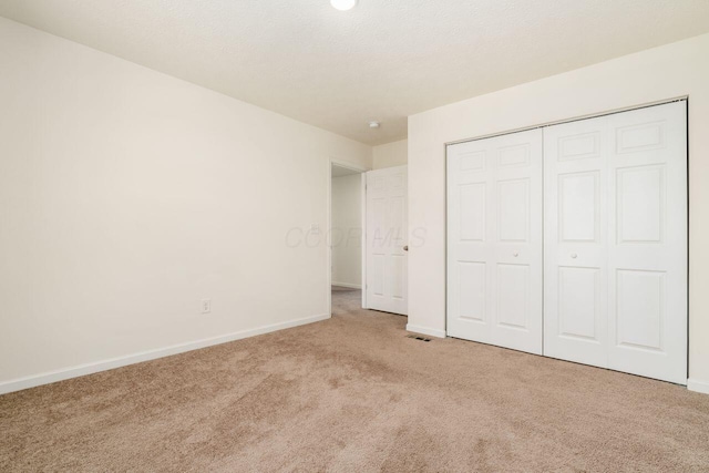 3339 Lauren Fields Dr S, Groveport, OH 43125 - unfurnished bedroom with carpet floors, baseboards, and a closet