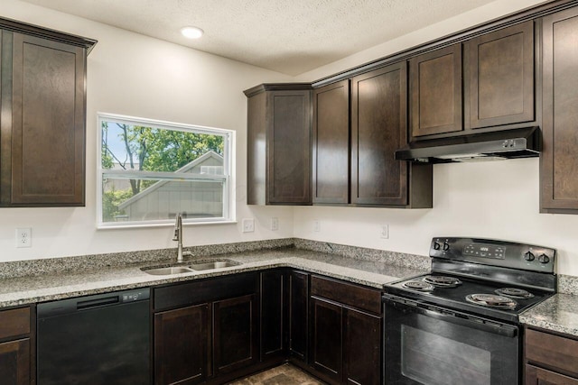 3339 Lauren Fields Dr S, Groveport, OH 43125 - kitchen featuring black appliances, under cabinet range hood, a sink, dark brown cabinets, and stone countertops