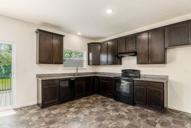 3339 Lauren Fields Dr S, Groveport, OH 43125 - kitchen featuring black appliances, dark brown cabinetry, stone counters, healthy amount of natural light, and recessed lighting
