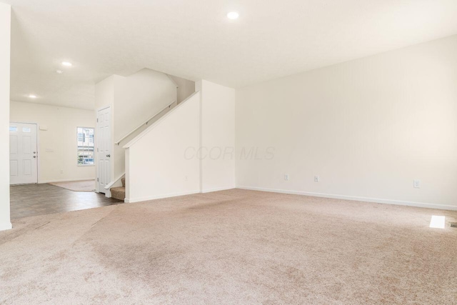3339 Lauren Fields Dr S, Groveport, OH 43125 - spare room with carpet, recessed lighting, stairway, and baseboards