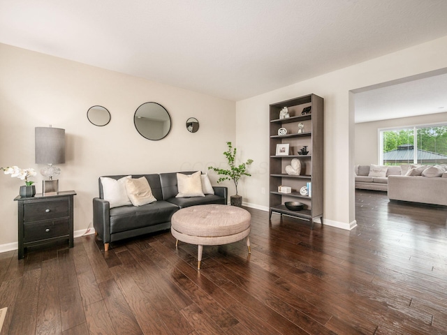 4783 Nieles Edge Dr, Columbus, OH 43232 - living room with dark wood-style flooring and baseboards