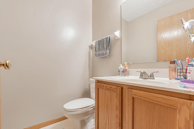 3150 Berkley Pointe Dr, Gahanna, OH 43230 - half bathroom featuring vanity, toilet, and baseboards