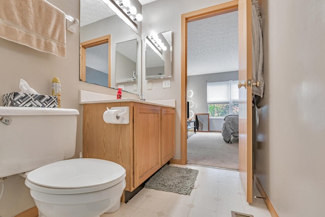 3150 Berkley Pointe Dr, Gahanna, OH 43230 - bathroom featuring toilet, a textured ceiling, vanity, and tile patterned floors