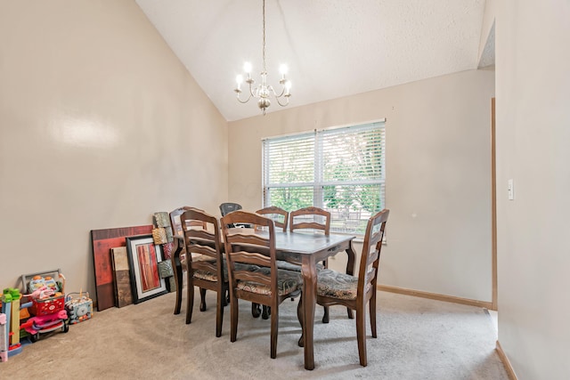 3150 Berkley Pointe Dr, Gahanna, OH 43230 - dining area featuring a chandelier, light colored carpet, baseboards, and high vaulted ceiling