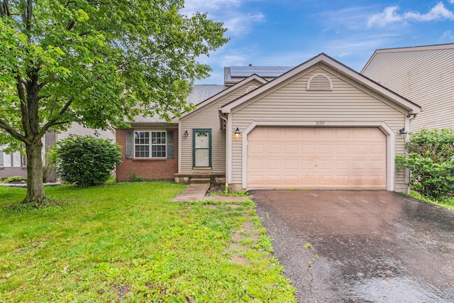3150 Berkley Pointe Dr, Gahanna, OH 43230 - single story home with a garage, asphalt driveway, a front lawn, and brick siding
