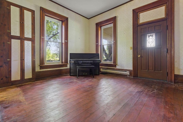 4093 State Route 257, Radnor, OH 43066 - foyer entrance featuring hardwood / wood-style flooring, ornamental molding, and a baseboard heating unit