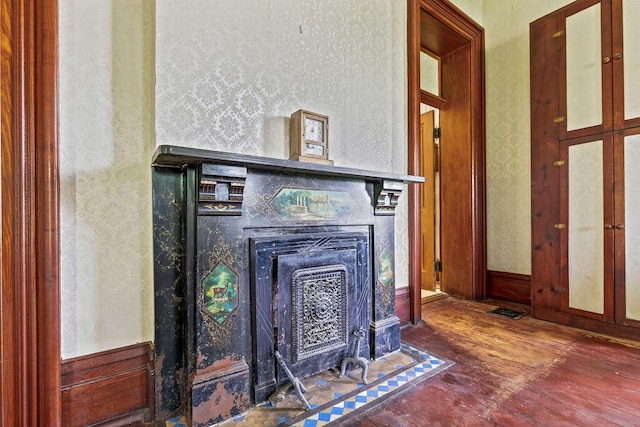 4093 State Route 257, Radnor, OH 43066 - detailed view of a fireplace with flush hearth, wood finished floors, and wallpapered walls