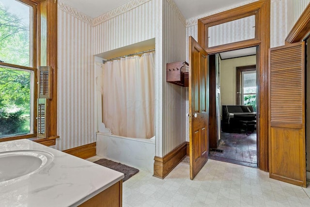 4093 State Route 257, Radnor, OH 43066 - bathroom featuring vanity, wallpapered walls, and a combined bath / shower with marble appearance
