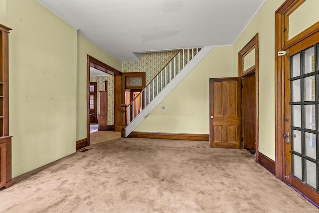 4093 State Route 257, Radnor, OH 43066 - unfurnished living room featuring carpet floors and stairs