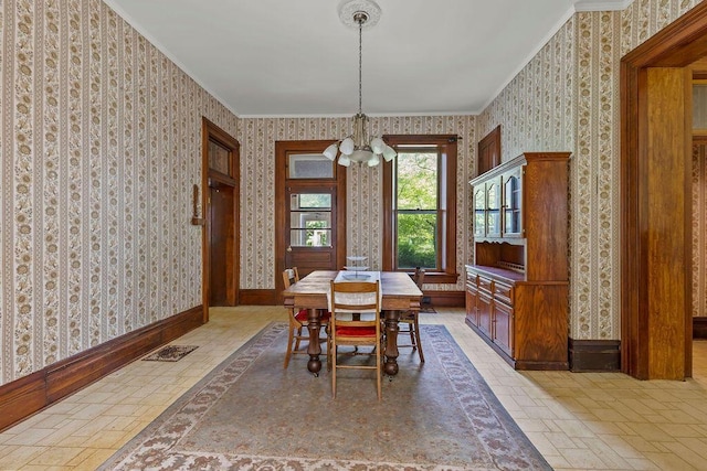 4093 State Route 257, Radnor, OH 43066 - dining room featuring wallpapered walls, a chandelier, and crown molding