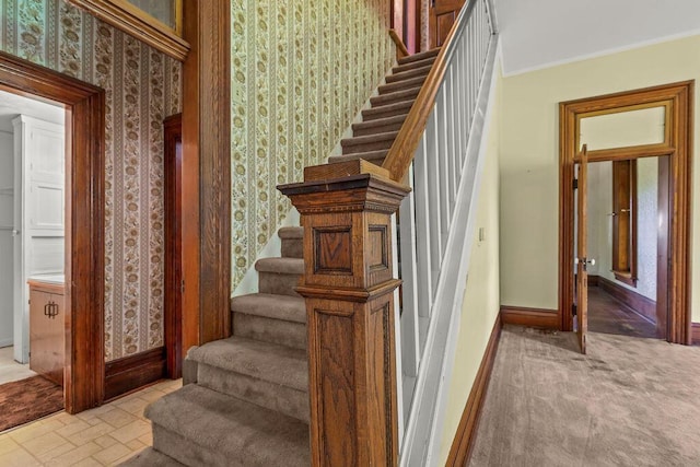 4093 State Route 257, Radnor, OH 43066 - staircase featuring wallpapered walls and ornamental molding