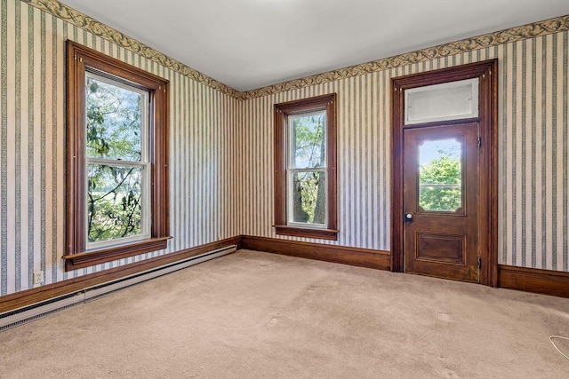 4093 State Route 257, Radnor, OH 43066 - carpeted spare room with wallpapered walls and a baseboard radiator