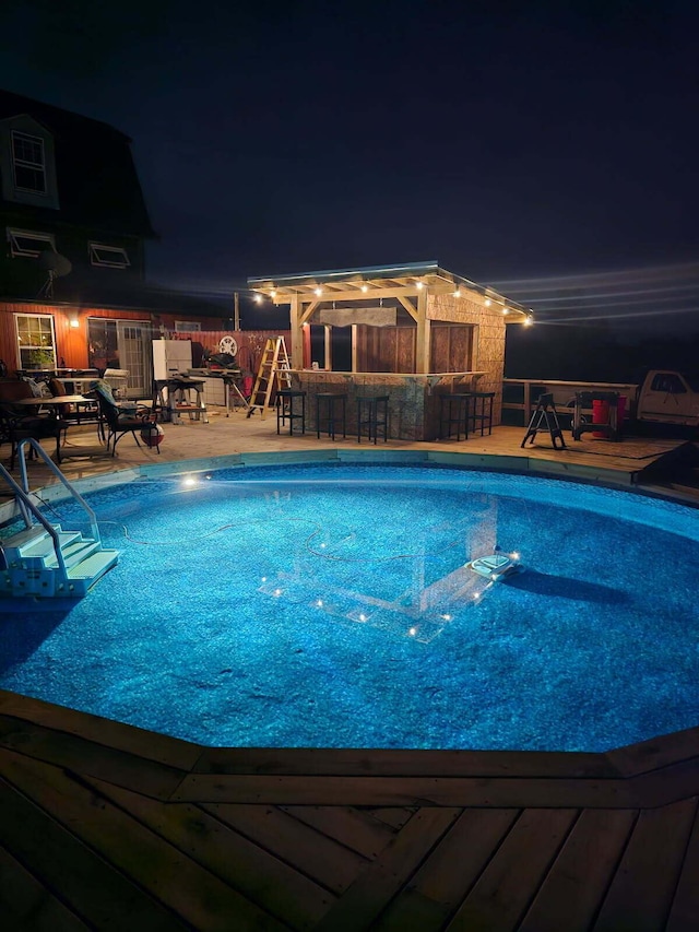 2309 N Houston Pike, South Vienna, OH 45369 - pool at twilight featuring an outdoor pool and a patio