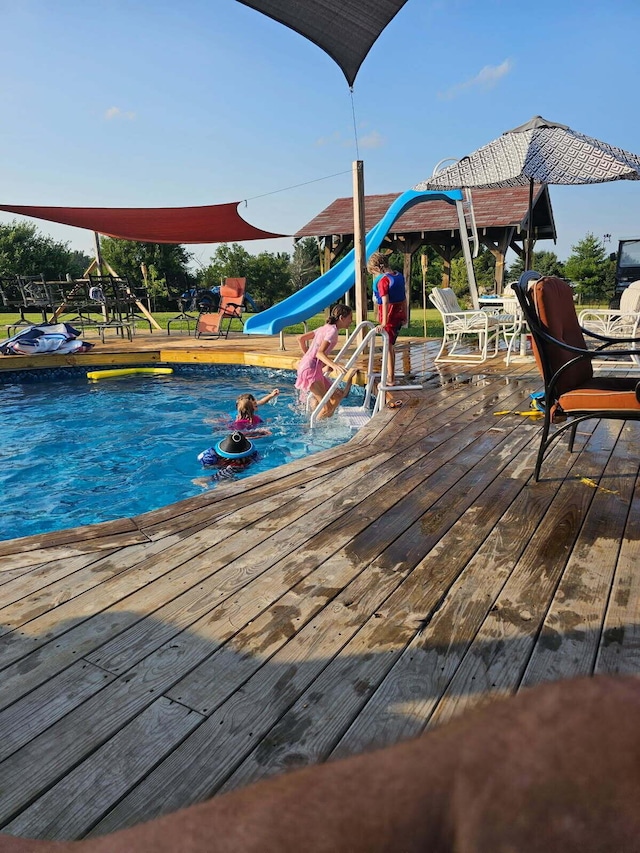 2309 N Houston Pike, South Vienna, OH 45369 - view of swimming pool featuring a playground and a deck
