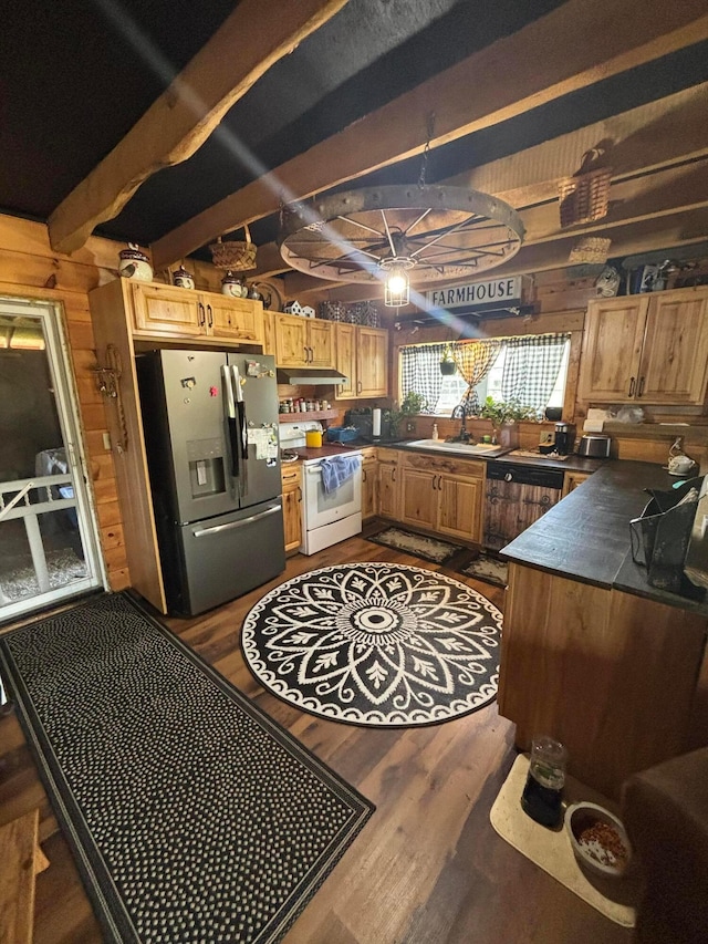 2309 N Houston Pike, South Vienna, OH 45369 - kitchen with stainless steel fridge with ice dispenser, electric range, a sink, dark wood-type flooring, and wood walls