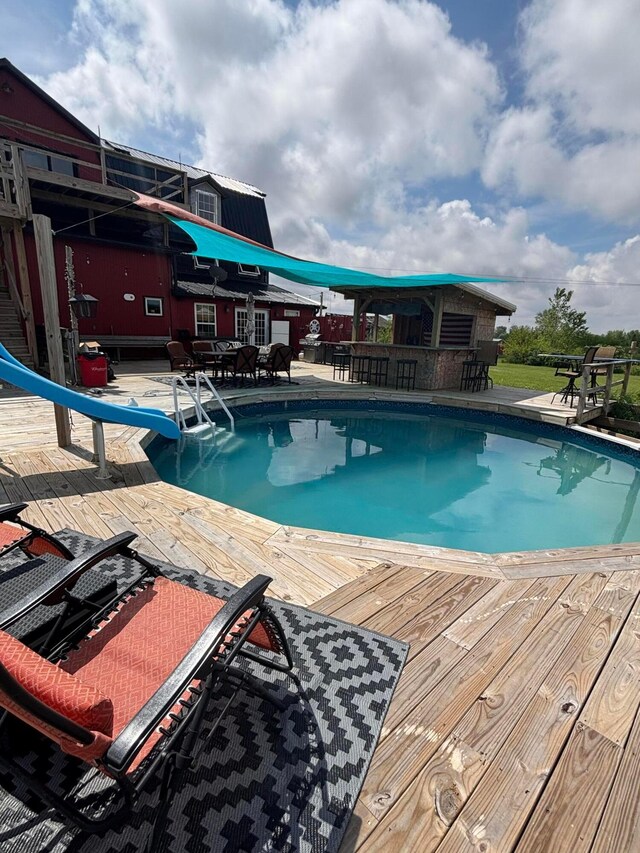 2309 N Houston Pike, South Vienna, OH 45369 - swimming pool with a water slide and a wooden deck